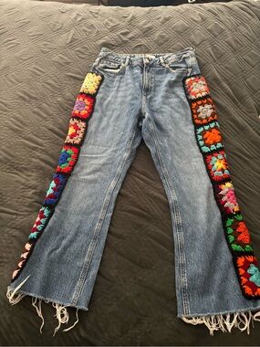 Vintage-Inspired Blue Denim Jeans with Multicolor Crochet Side Panels